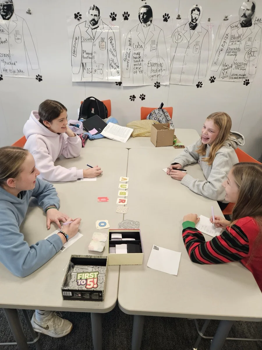 Students playing vocabulary games in classroom